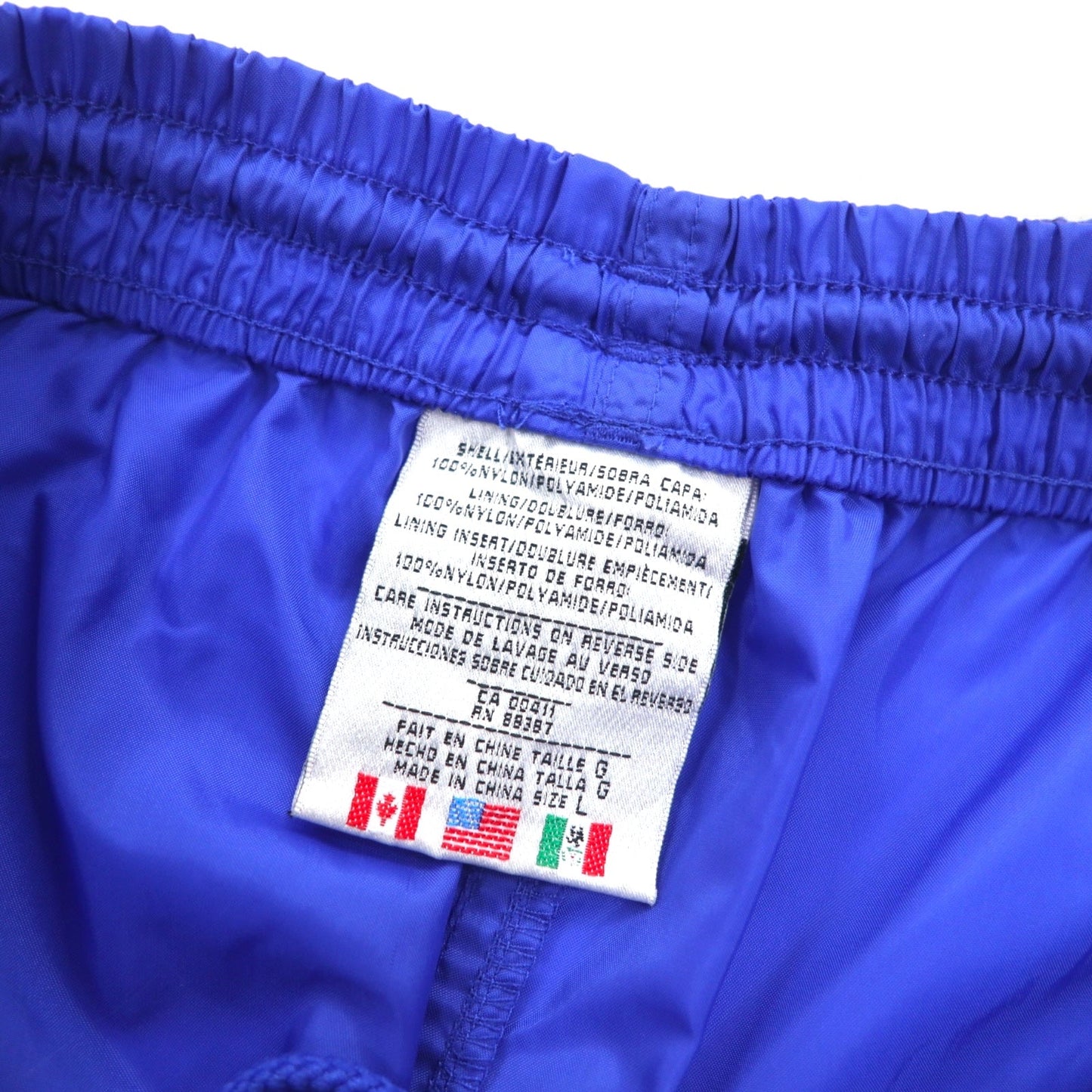 adidas 90年代 万国旗タグ ナイロン トラックパンツ ジャージ L ブルー 3ストライプ