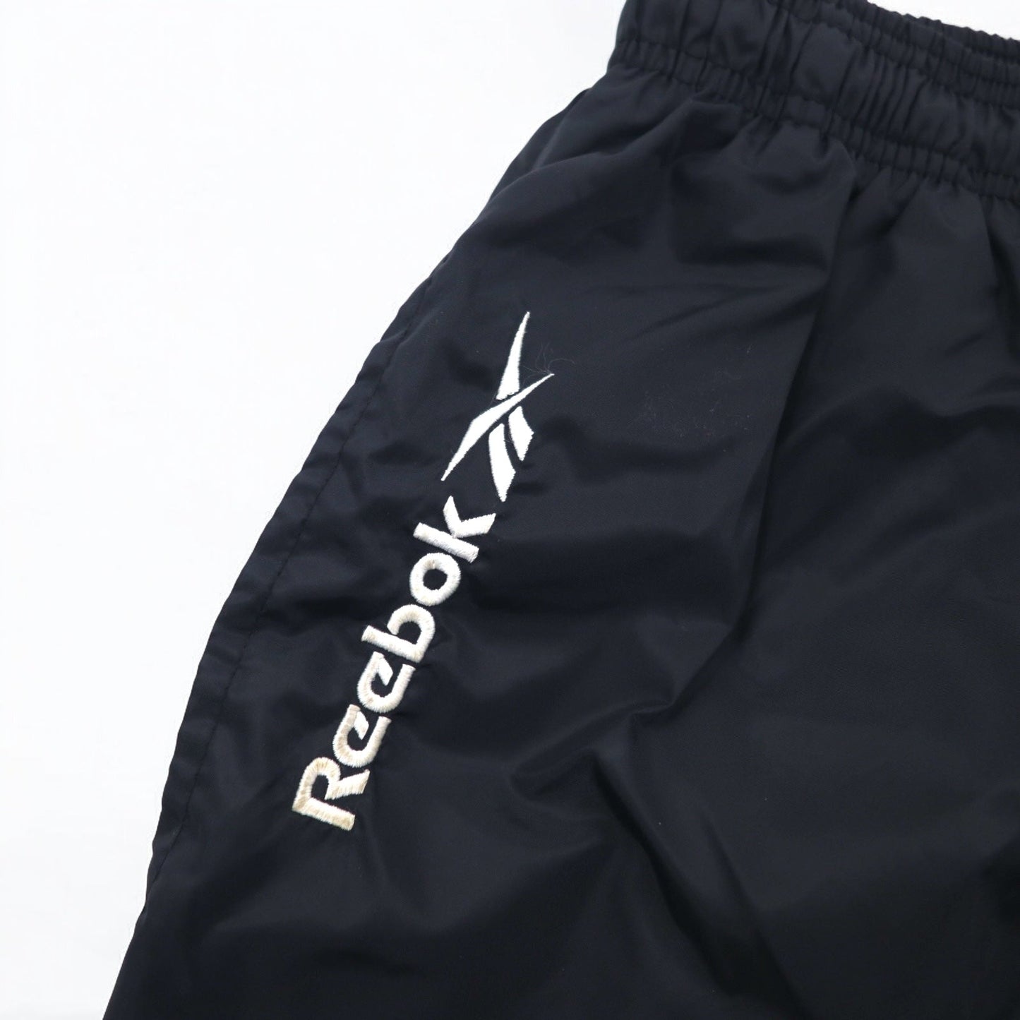 Reebok 90年代 ナイロン トラックパンツ ジャージ M ブラック ベクターロゴ刺繍 スリット 裾ジップ
