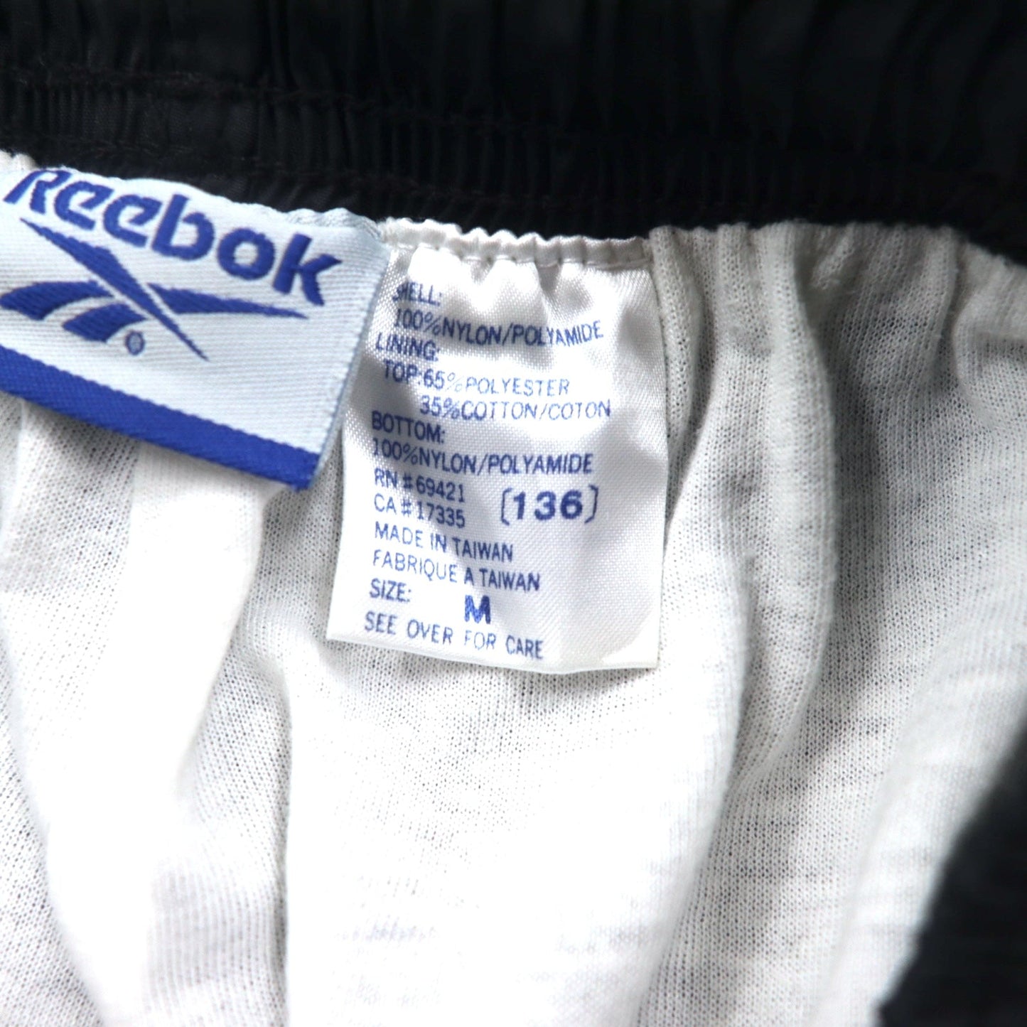 Reebok 90年代 ナイロン トラックパンツ ジャージ M ブラック ベクターロゴ刺繍 スリット 裾ジップ
