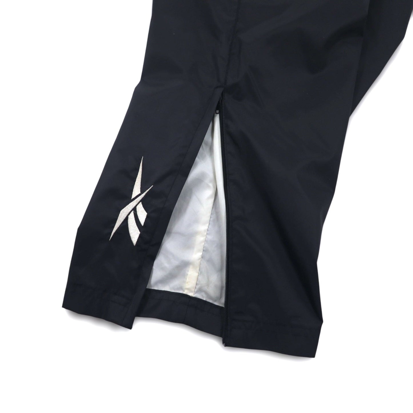 Reebok 90年代 ナイロン トラックパンツ ジャージ M ブラック ベクターロゴ刺繍 スリット 裾ジップ