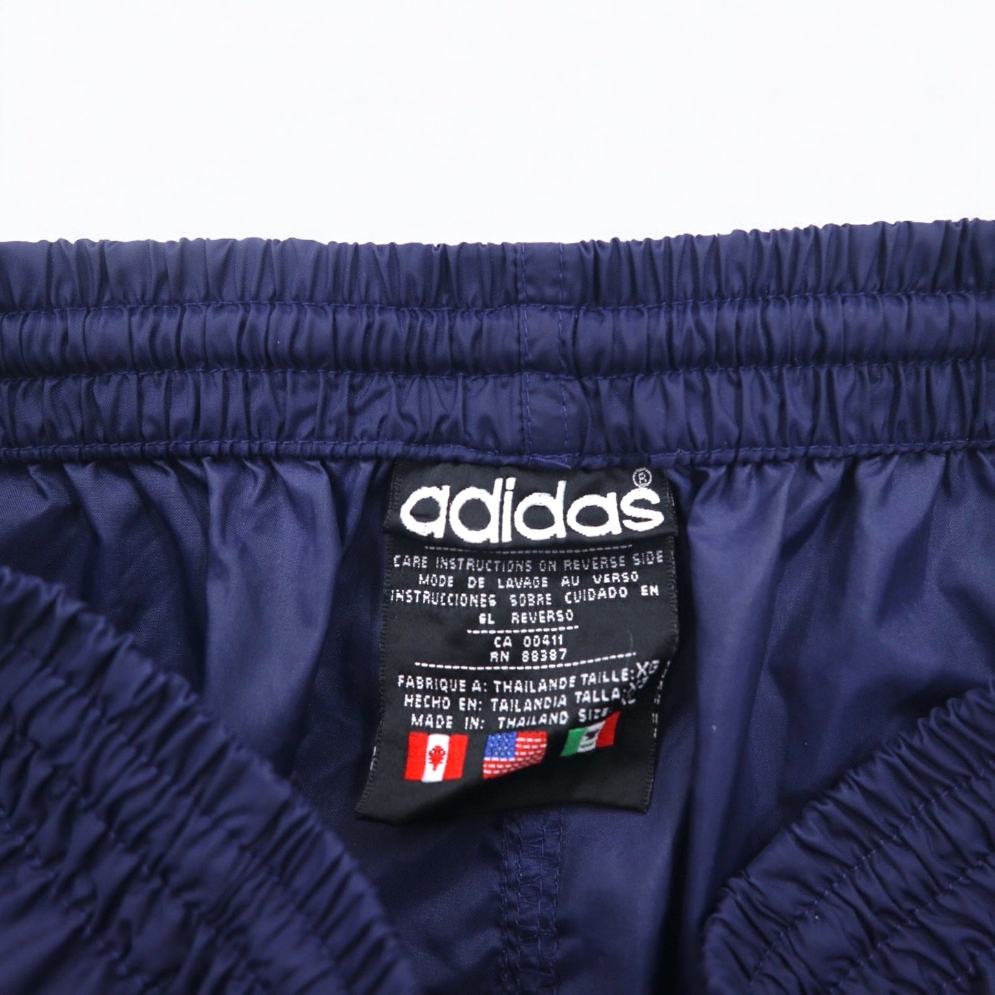 adidas 90年代 万国旗タグ ナイロン トラックパンツ ジャージ XL ネイビー 3ストライプ 裾ジップ スリット