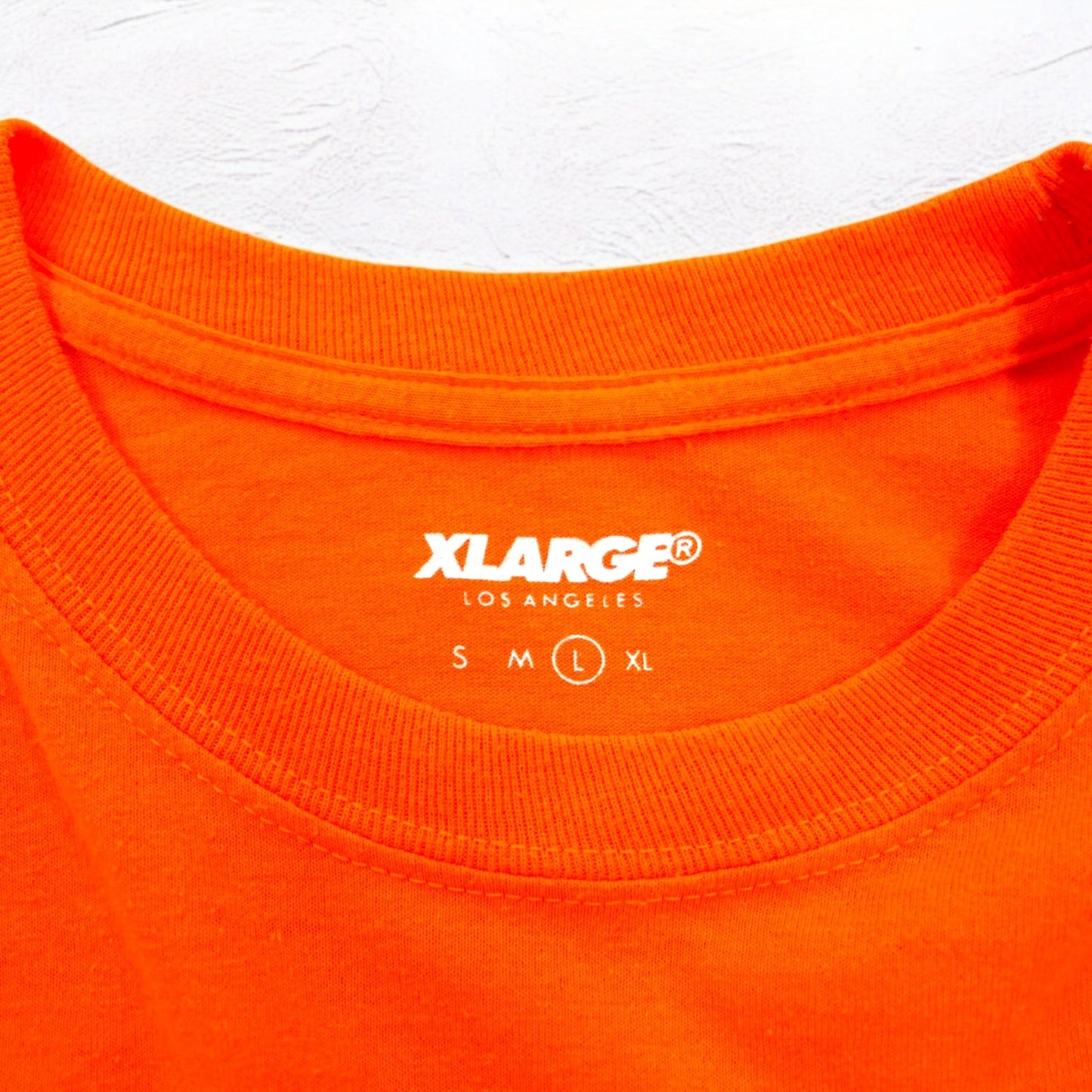 X-LARGE ロゴプリント ロングスリーブTシャツ ロンT L オレンジ コットン 両面プリント