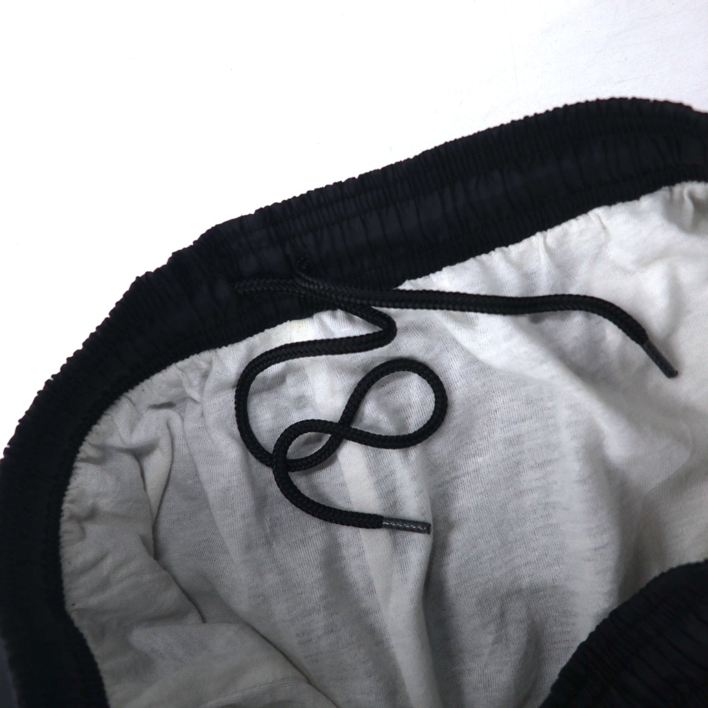 Reebok 90年代 ナイロン トラックパンツ ジャージ M ブラック ベクターロゴ刺繍 スリット 裾ジップ