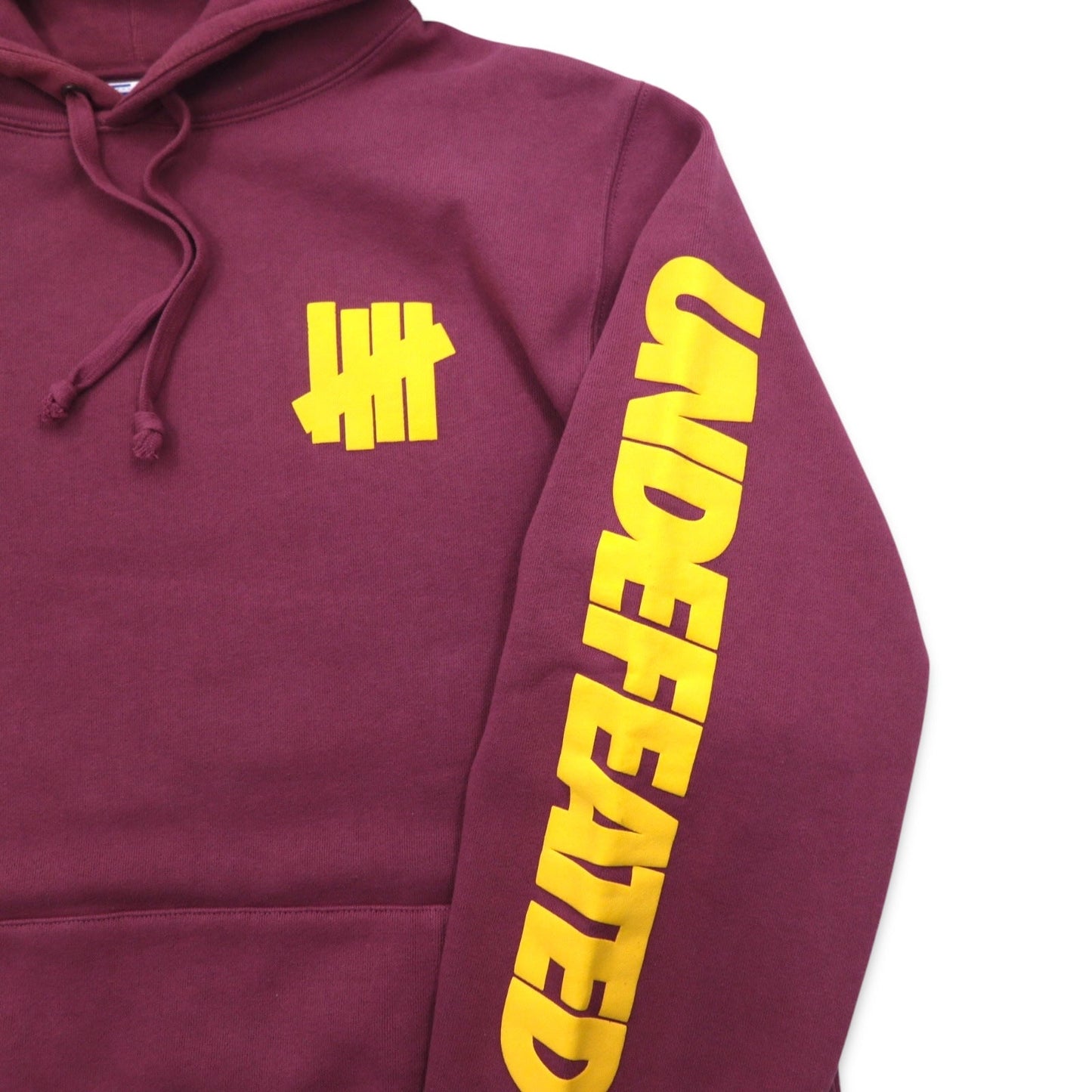 UNDEFEATED ロゴプリント プルオーバー パーカー L ピンク コットン 袖プリント