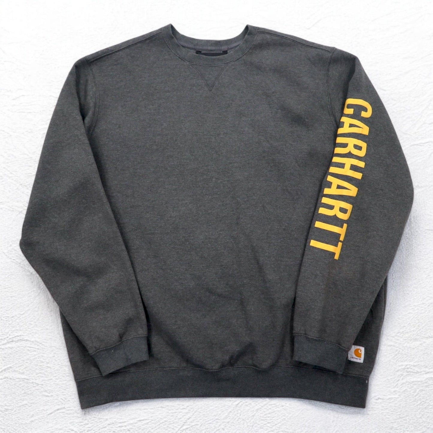 Carhartt ルーズフィット ミッドウェイト クルーネック スウェット 2XL グレー 裏起毛 袖 ルーズフィット ミッドウェイト クルーネック ロゴ 袖 グラフィック スウェットシャツ TS5444 105444 メキシコ製